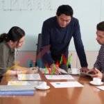 Churn Prediction Service an image of executive looking at their works on the table
