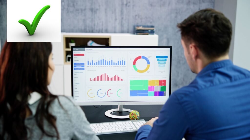 Marketing analytics consultant for paid media agencies. i picture of workers looking at a web analytic dashboard